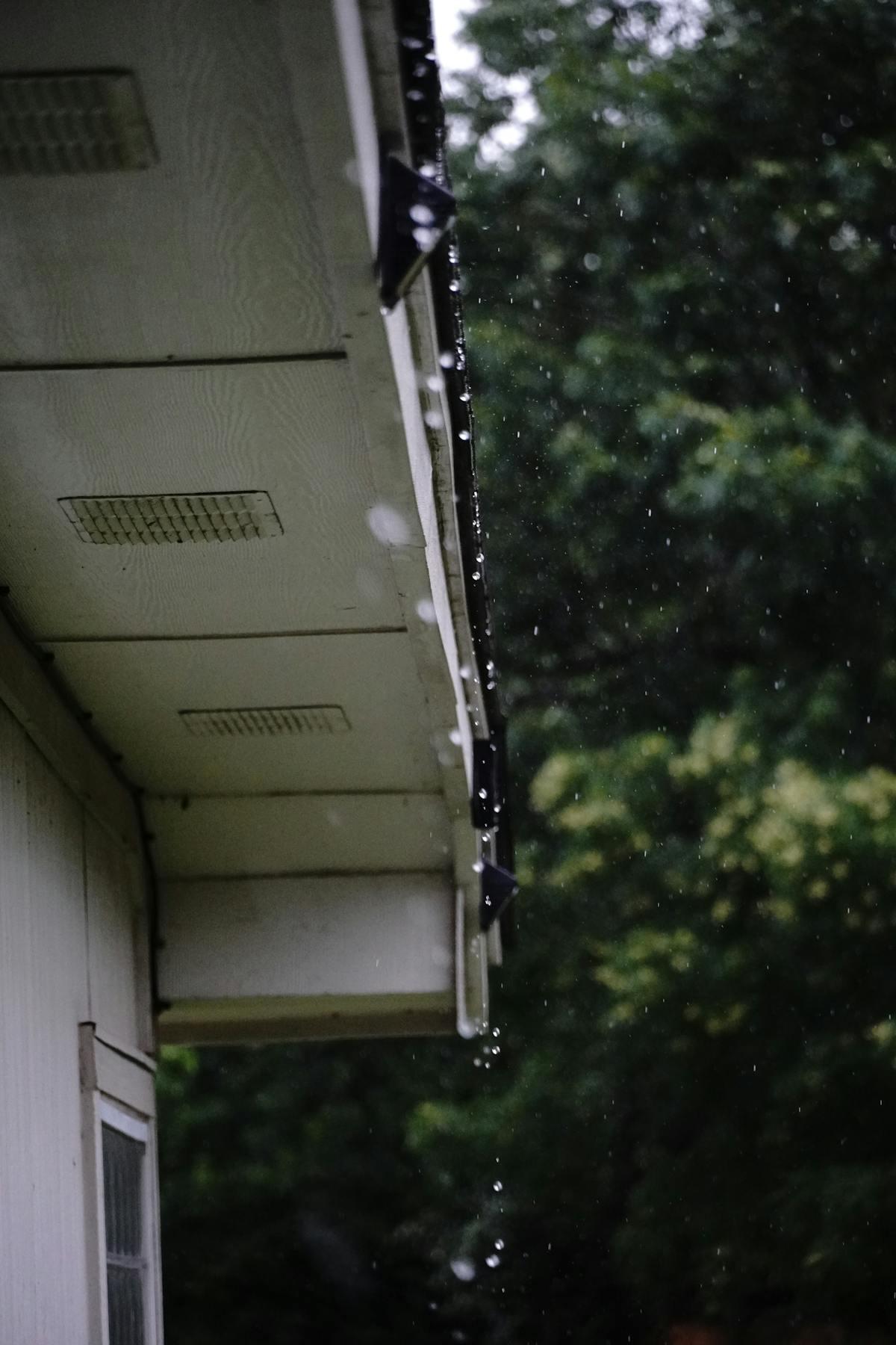 Rain water flowing properly off a gutter on a residential home